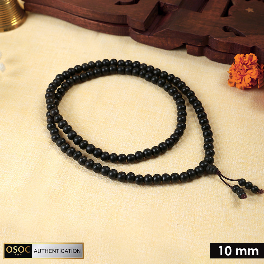100% original and government certified 10 mm Karungali mala with matt finish and Sumeru bead, ideal for meditation, spiritual protection, and positive energy. India’s Premium Jap Mala Store - www.satvikstore.in