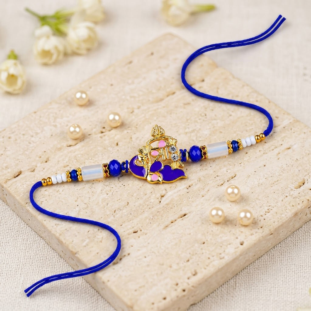 Royal Blue Crystal and Gold Accent Shree Charm Rakhi