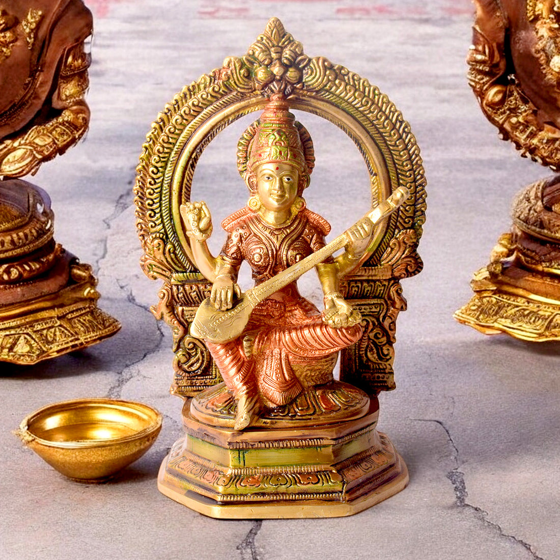 9.2 Inch Brass Goddess Saraswati Statue depicting the deity seated gracefully with veena, symbolizing wisdom, knowledge, and arts, ideal for home temple or study décor. No.1 Brass Idol Store www.satvikstore.in