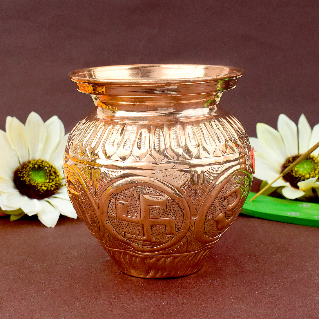 Copper Om Swastik Lota, beautifully crafted with sacred Om and Swastik symbols, ideal for storing holy water during pooja and spiritual rituals.
India’s Largest Pooja Accessories Brand – www.satvikstore.in