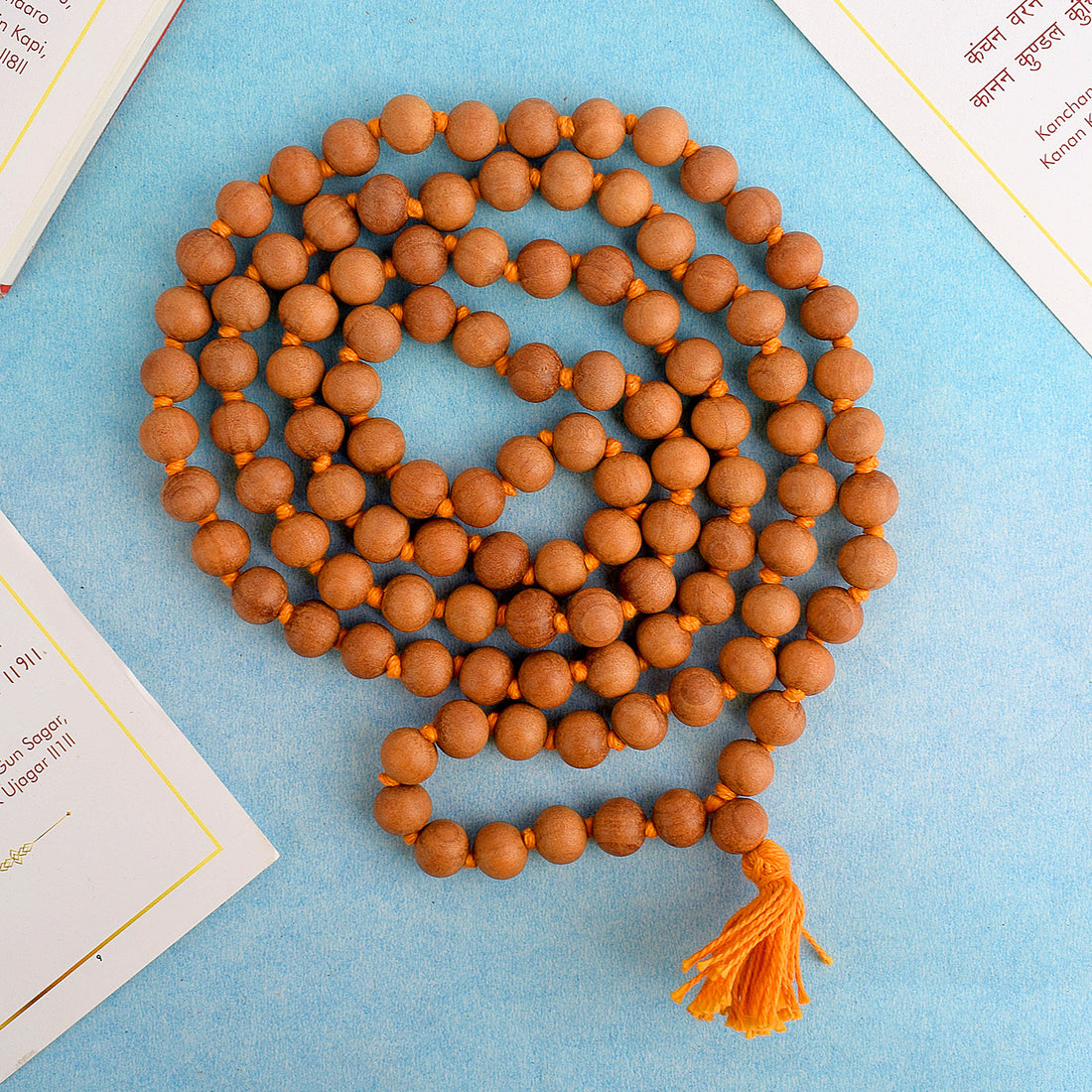 Regular Chandan Jaap Mala made from natural sandalwood beads, strung together for meditation and prayer. India’s Premium Jap Mala Store- www.satvikstore.in