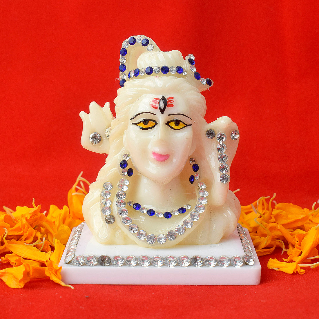 Elegant Marble Shiv Idol, showcasing Lord Shiva in a divine seated posture, crafted with intricate details and a polished finish, perfect for worship or home temple decor.India’s Largest Pooja Accessories Brand – www.satvikstore.in