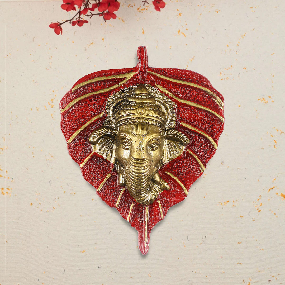 1 Pc Lord Ganesh Face on Leaf Patta Wall Hanging - Blue