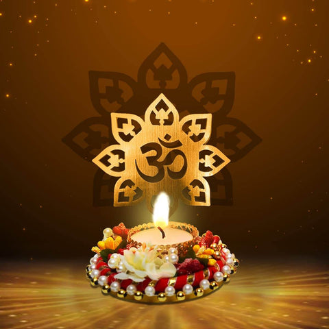 Beautiful Decorative OM Shadow Diya made of metal, casting a sacred 'OM' shadow when lit, ideal for spiritual ambiance, meditation, home temple dΓ©cor, and festive lighting. Indiaβs Largest Pooja Accessories Brand β www.satvikstore.in