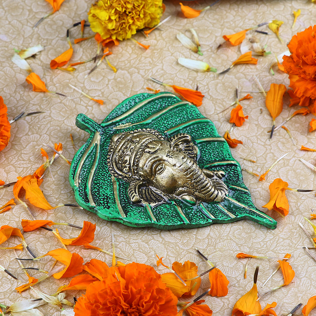 1 Pc Lord Ganesh Face on Leaf Patta Wall Hanging Yellow
