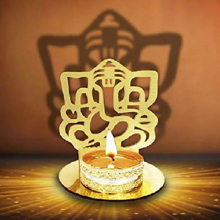 Lord Ganesha Shadow Diya, an intricately designed metal lamp featuring Lord Ganesha's image, casting a beautiful shadow when lit. Perfect for home decor, puja, and spiritual settings. India’s Largest Pooja Accessories Brand – www.satvikstore.in