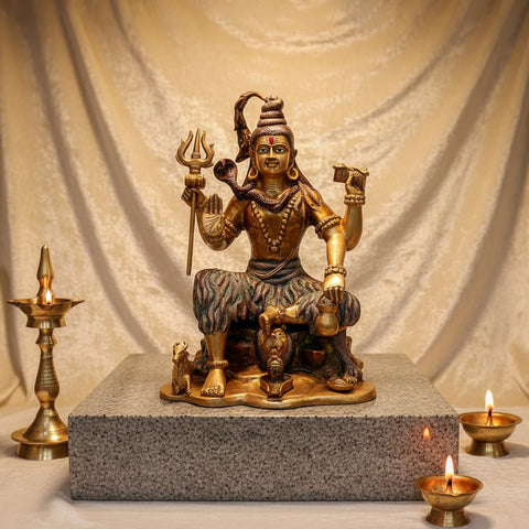 Brass Idol of 18.5 Inch Handcrafted Brass Statue of Lord Shiva. Bring divine energy and serenity into your space with this stunning 18.5-inch Brass Statue of Lord Shiva. Expertly crafted from high-quality brass, this statue beautifully depicts Lord Shiva in a powerful yet peaceful stance, symbolizing, strength and tranquility. India's Largest Puja Accessories Brand - Satvik