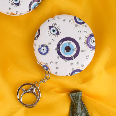 Round Evil Eye Keychain with Foldable Mirror – Stylish, practical, and protective keychain for everyday use. India’s Largest Pooja Accessories Brand – www.satvikstore.in

