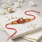 Multicolor Stone Floral Motif Golden Pearl Beaded Rakhi