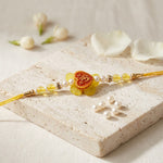 Cute Heart Om and Swastik Yellow Flower Kids Rakhi