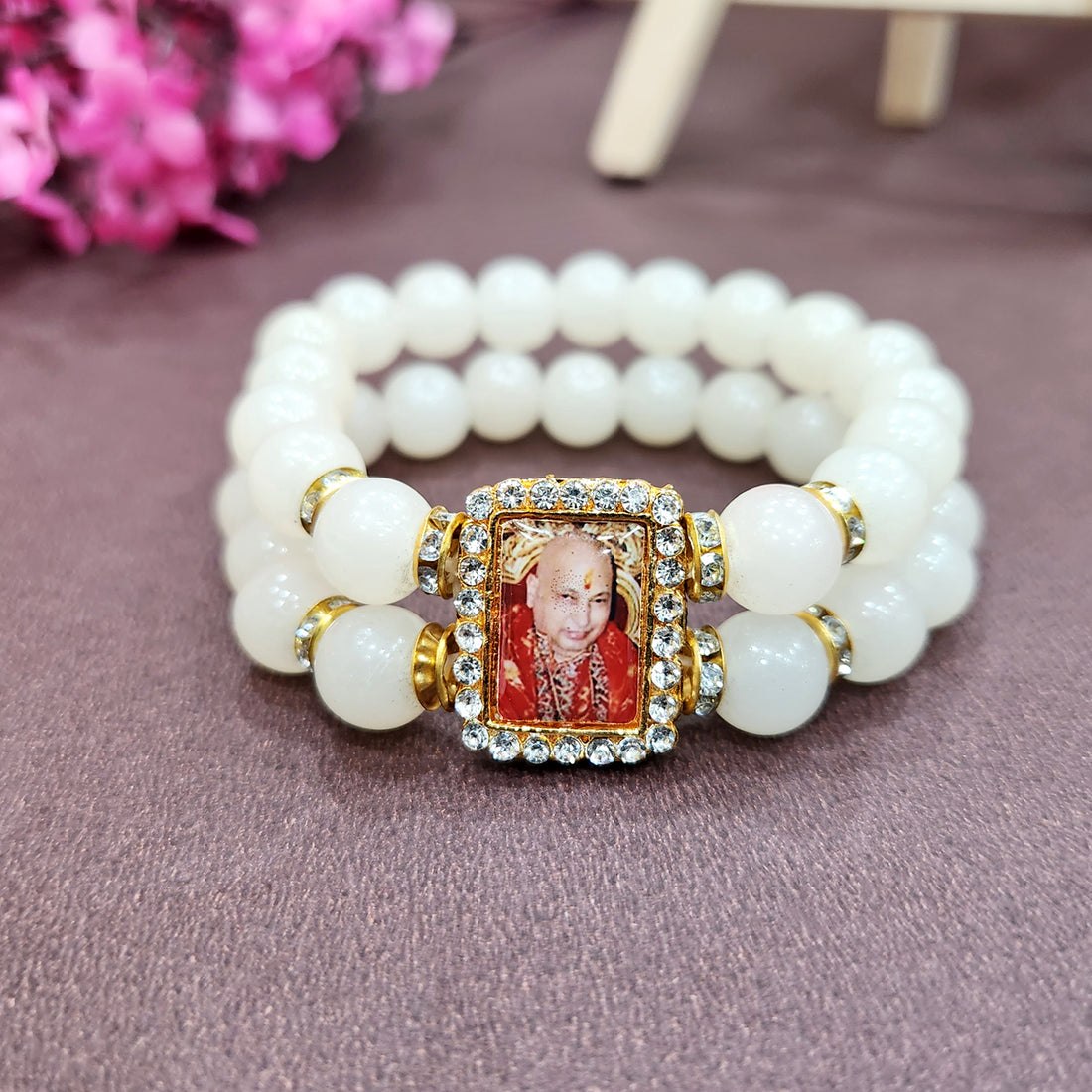 Off White Round Pearl Bracelet with Jai Guruji Swaroop