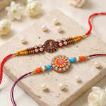 Traditional Divine Krishna and Orange Flower Rakhi (Set of 2)