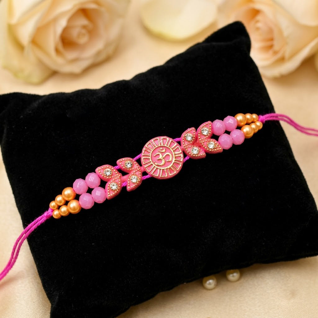 Traditional Devotional Pink Om Centerpiece Stone Encrusted Rakhi