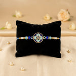 Traditional Royal Blue Floral Enamel Dial Rakhi