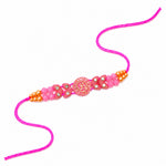 Traditional Devotional Pink Om Centerpiece Stone Encrusted Rakhi