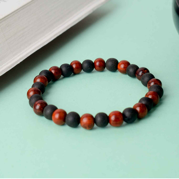 8mm Red and Ebony Bracelet – handcrafted bracelet featuring alternating red sandalwood and ebony beads for a bold and balanced spiritual look. India’s Largest Pooja Accessories Brand - www.satvikstore.in 