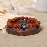 8mm Rudraksha bracelet with evil eye bead for protection and positive energy. India’s Largest Pooja Accessories Brand – www.satvikstore.in
