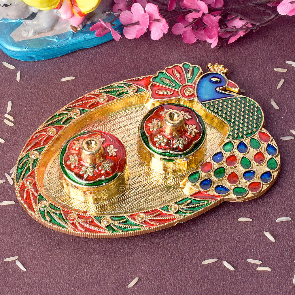 Artistic peacock-themed kumkum holder crafted with intricate detailing, perfect for traditional rituals and festive decor. India’s Largest Pooja Accessories Brand – www.satvikstore.in 