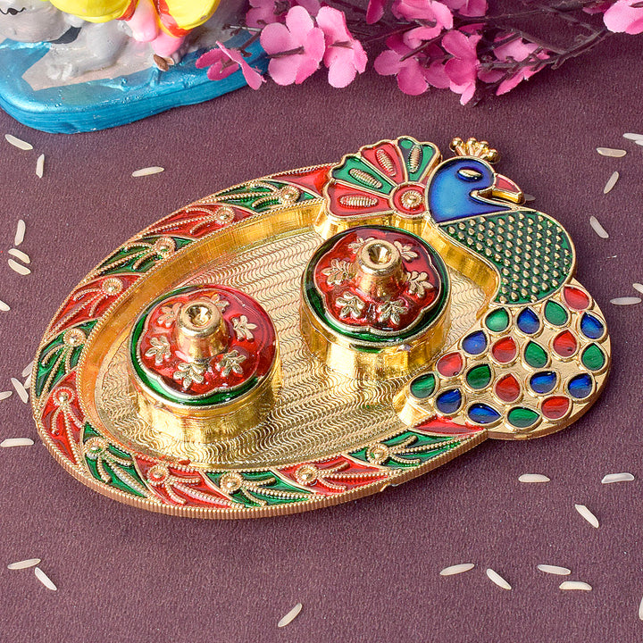 Artistic peacock-themed kumkum holder crafted with intricate detailing, perfect for traditional rituals and festive decor. India’s Largest Pooja Accessories Brand – www.satvikstore.in 