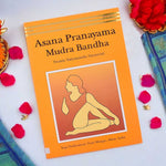 Front cover of the "Asana Pranayama Mudra Bandha – Golden Jubilee Edition" paperback, a comprehensive guide to yogic practices by Bihar School of Yoga. India’s Largest Pooja Accessories Brand – www.satvikstore.in