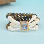 Black & Yellow with White Pearl Four Layer Guruji Swaroop Bracelet featuring striking black and yellow beads accented with luminous white pearls and Jai Guruji Swaroop – perfect for spiritual wear, festive gifting, and daily devotion. India’s Largest Pooja Accessories Brand – www.satvikstore.in