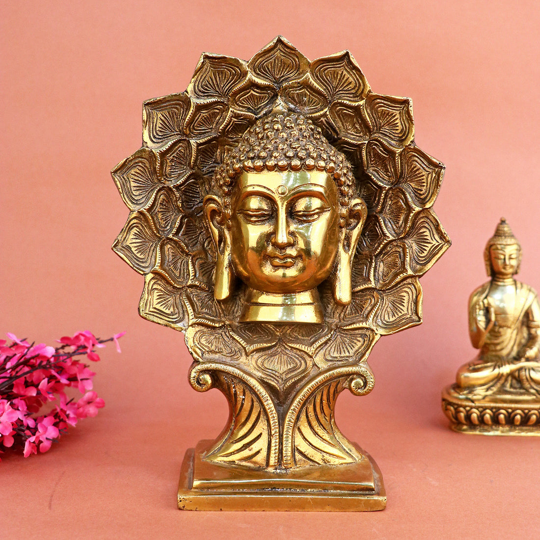9.5-inch Brass Buddha Face Statue showcasing a serene expression, intricate detailing, and antique finish, ideal for meditation spaces and spiritual home decor. No.1 Brass Idol Store www.satvikstore.in 
