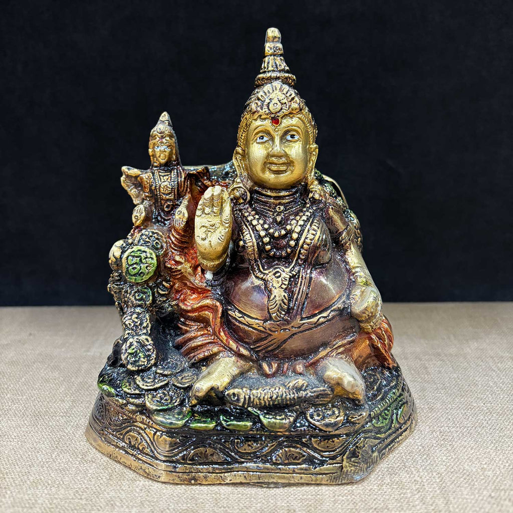 6.5 Inch Auspicious Lord Kuber Idol with Laxmi Ji made from premium brass, symbolizing divine wealth and prosperity, ideal for Diwali, Dhanteras, and home temple decor. No.1 Brass Idol Store www.satvikstore.in 
