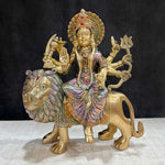Embrace the powerful energy of Maa Durga with this 9-inch Brass 8-Armed Durga Idol, beautifully depicted riding her mighty lion. This meticulously crafted statue showcases Maa Durga in her most majestic form, symbolizing strength, courage, and divine protection. No.1 Brass Idol Store www.satvikstore.in 
