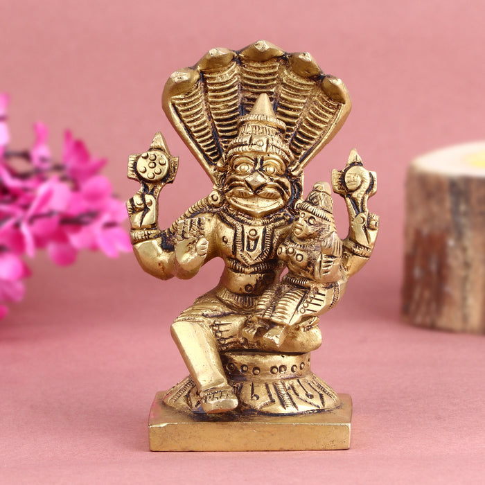 Brass Narsimha Laxmi Idol handcrafted for home temple, puja rituals, festivals, and spiritual décor, symbolizing divine protection, prosperity, and blessings. India’s Largest Pooja Accessories Brand – www.satvikstore.in
