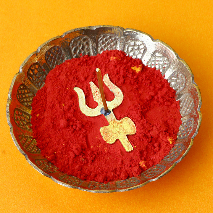 Brass Trishul with Damru Tilak Stamp, a sacred brass stamp featuring Lord Shiva’s Trishul and Damru symbol, used for applying tilak during pooja and spiritual rituals. 
India’s Largest Pooja Accessories Brand – www.satvikstore.in 