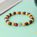 Buddha Red and White Sandalwood Bracelet with dual-tone sacred beads for peace and strength – spiritual wrist accessory. India’s Largest Pooja Accessories Brand - www.satvikstore.in 