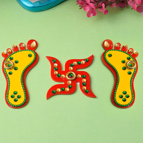 Divine Impressions Charanpaduka and Swastik wall decals featuring sacred footprints and Swastik symbols, perfect for home entrances, pooja rooms, and temple décor to invite blessings and positivity. India’s Largest Pooja Accessories Brand – www.satvikstore.in 