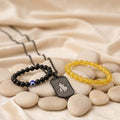 Citrine Bracelet, Black Obsidian Evil Eye Bracelet and Hare Krishna Hare Rama micro-carved pendant combo displayed in a spiritual lifestyle setting, symbolizing protection, positivity and divine energy. India’s Largest Puja Accessories Brand- www.satvikstore.in
