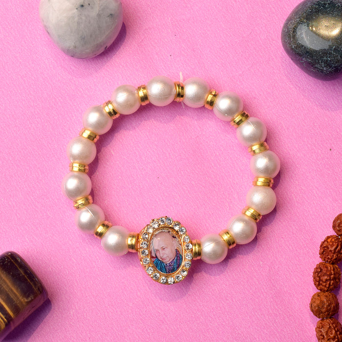 White and Golden Beads Bracelet with Jai Guruji Swaroop