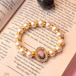 White and Golden Beads Bracelet with Jai Guruji Swaroop