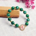 Dark Green Round Pearl Bracelet with Jai Guruji Swaroop Handmade Bracelets for Men and Women