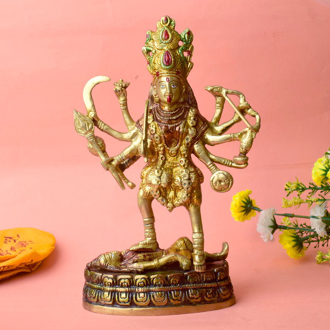 Embrace the divine power and energy of Kali Mata with this intricately handcrafted 9-inch Brass Kali Mata Idol. Known as the goddess of destruction, transformation, and liberation, Kali Mata represents the removal of negativity and the triumph of good over evil.