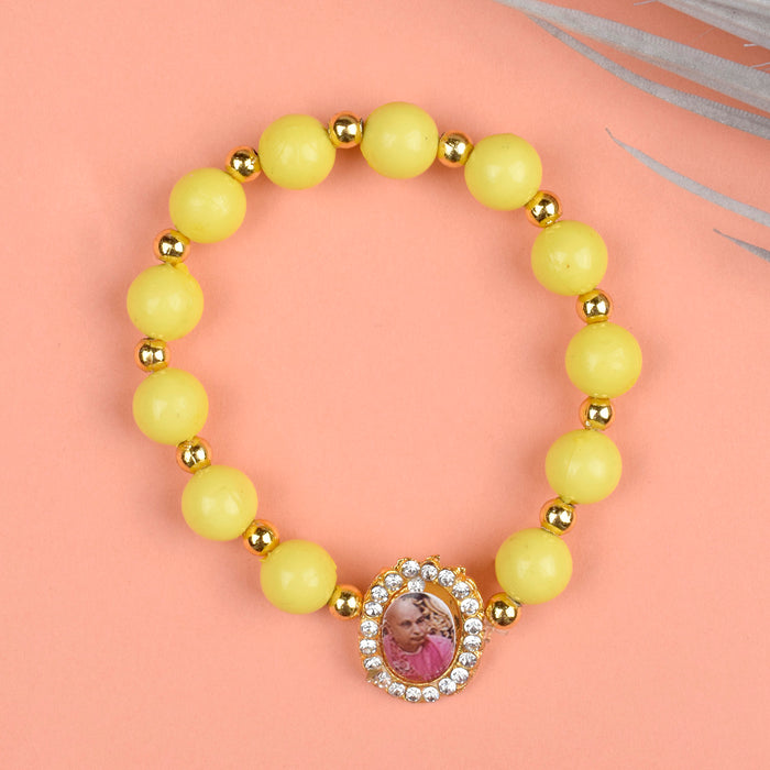 Yellow Bead Bracelet with Jai Guruji Swaroop