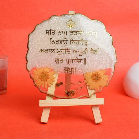 Decorative Ik Onkar Mantra White Frame with Stand Made with Epoxy – Elegant white epoxy frame featuring the sacred Ik Onkar Mantra, perfect for spiritual decor with a stand for easy display. India’s Largest Pooja Accessories Brand – www.satvikstore.in