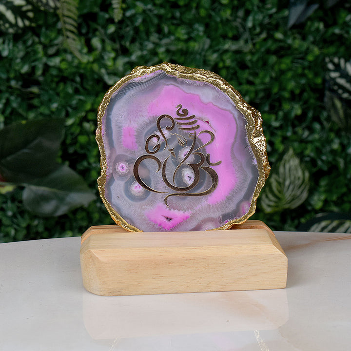 Divine Ganesha Agate Stone Stand featuring a beautifully hand-painted image of Lord Ganesha on a polished agate slice, elegantly displayed on a metal stand for spiritual home decor. India’s Largest Pooja Accessories Brand – www.satvikstore.in