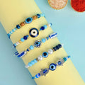 Set of 5 Designer Rakhi Threads with Roli Chawal and Ram Sita Stickers for Raksha Bandhan Celebration. India’s Largest Pooja Accessories Brand - www.satvikstore.in