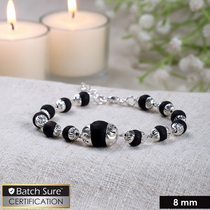 Govt. certified 8mm silver-plated Karungali bracelet featuring a big Karungali bead with polished traditional finish for spiritual and daily wear. India’s Largest Puja Accessories Brand- www.satvikstore.in