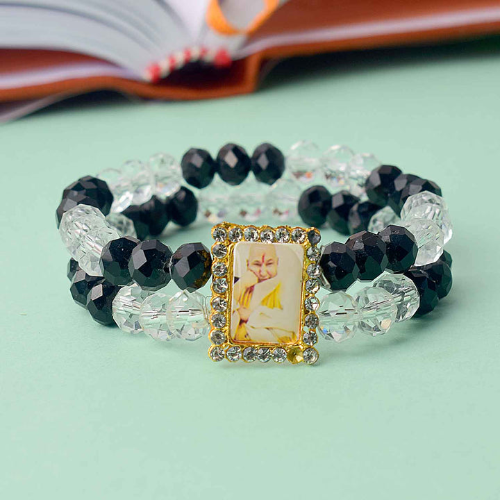 Guruji Swaroop Bracelet featuring clear and black beads – perfect for daily wear, spiritual occasions, and gifting. India’s Largest Pooja Accessories Brand – www.satvikstore.in