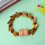 Handcrafted Guruji Swaroop Bracelet with golden butterfly charms and black-red colored beads, ideal for spiritual wear and gifting. India’s Largest Pooja Accessories Brand – www.satvikstore.in

