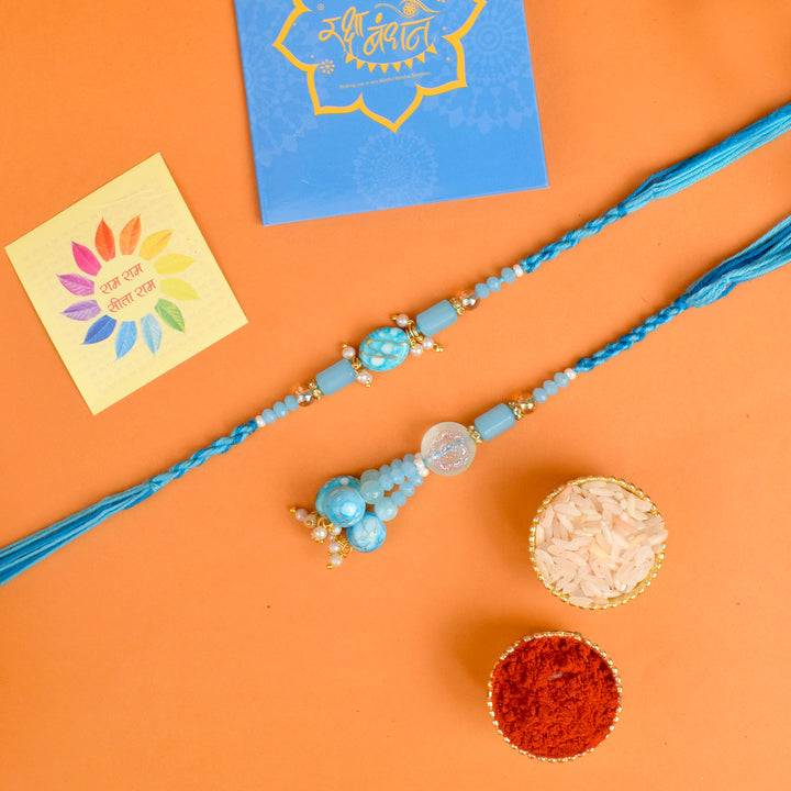 Designer Couple Rakhi Set for Bhaiya and Bhabhi with Roli Chawal and Ram Sita Stickers – Raksha Bandhan Gift Combo. India’s Largest Brass Idols Brand - www.satvikstore.in