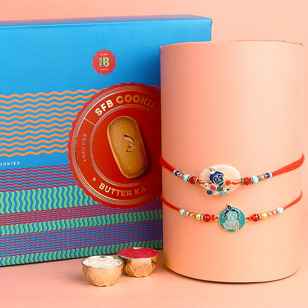 Image of a beautifully designed Rakhi with sweets, the perfect combination of tradition and sweetness for Raksha Bandhan celebration. Shop now at SatvikStore.in. #Rakhi #RakhiOnline #SendRakhi #DesignerRakhi #BeautifulRakhi #LatestRakhi #NewRakhi #ModernRakhi"