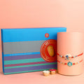 Image of a beautifully designed Rakhi with sweets, the perfect combination of tradition and sweetness for Raksha Bandhan celebration. Shop now at SatvikStore.in. #Rakhi #RakhiOnline #SendRakhi #DesignerRakhi #BeautifulRakhi #LatestRakhi #NewRakhi #ModernRakhi"