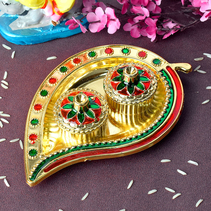 Leaf-inspired kumkum holder crafted with precision, featuring detailed traditional design for ritualistic and decorative use. India’s Largest Pooja Accessories Brand – www.satvikstore.in 
