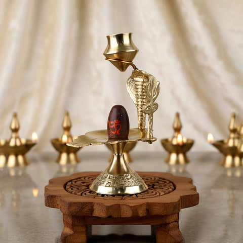 Pure Brass Divine Small Narmadeshwar Shivling, a beautifully crafted small-sized Shivling made from pure brass, symbolizing Lord Shiva and perfect for worship and spiritual rituals. 
India’s Largest Pooja Accessories Brand – www.satvikstore.in 