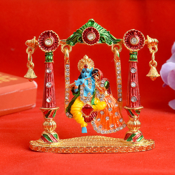 Radha Krishna on Swing idol, intricately designed to depict the divine couple in a joyful and serene moment, symbolizing love and devotion. India’s Largest Pooja Accessories Brand – www.satvikstore.in 
